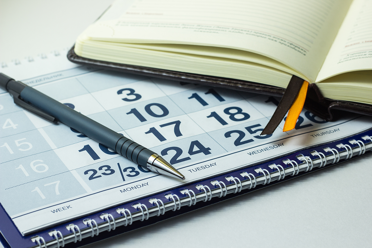 Kalender mit Stift
